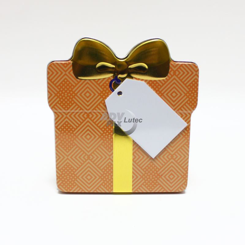 Schmuckdose Geschenkdose orangenes Muster mit goldener stilisierter Schleife, Weißblechdose Draufsicht stehend